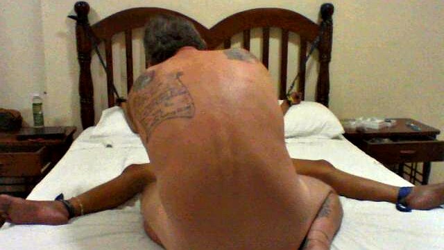 tied up, gagged & hooded,oiled up,stretch out arms and leg