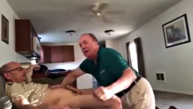 Clothed grandpa on his knees sucking daddy's cock