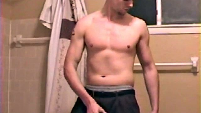 After a busy day, Sean is in the bathroom getting ready to take a shower and decides to play with himself through his pants. He strips and bends over for the camera while stroking his hard cock and soon Sean is pouring a warm load of cum all over his chest.
