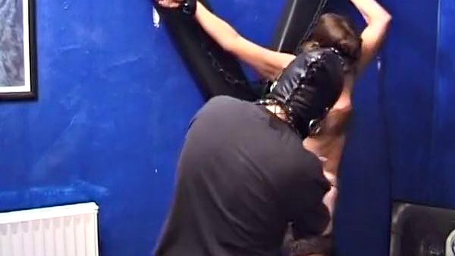 A mature German slut in stockings gets spanked hard in BDSM action