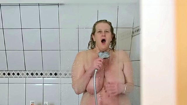 Mature with big tits stepmom fingers herself in the shower