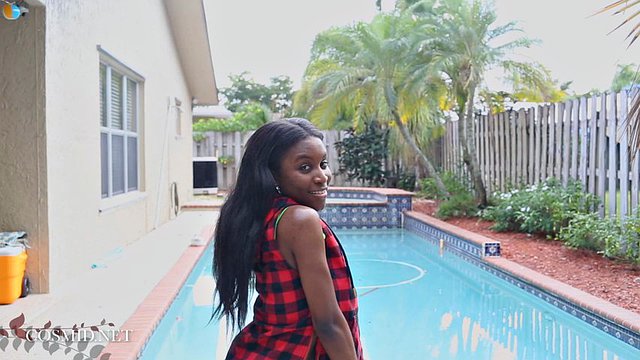 Breathtaking black teen rubbing her sweet clit by the pool