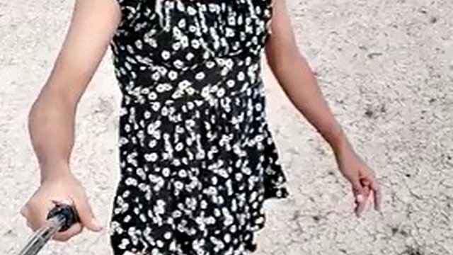 Sexy ladyboy walks wearing miniskirt and sandals very hot