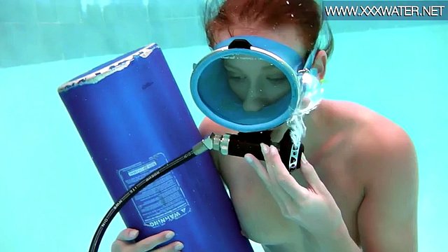 Hungarian beauty fucks a dildo underwater