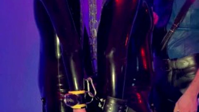 Electro session for the two rubber slaves tied together