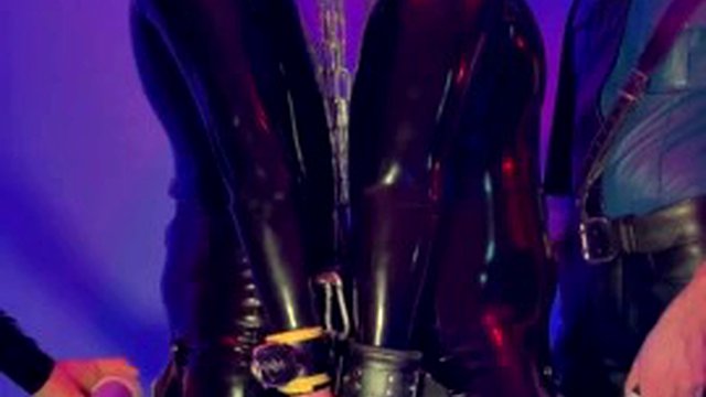 Electro session for the two rubber slaves tied together