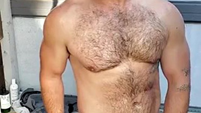 Muscle jock cums after sexy oil shower, slow mo hands free cum