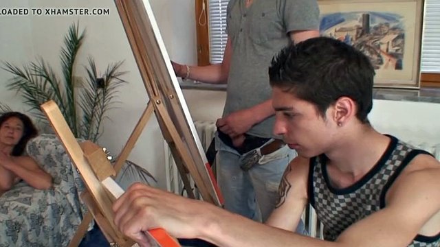 Two teen boys share a mature woman