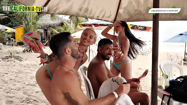 Hot influencer kisses married tourist on beach in Brazil!