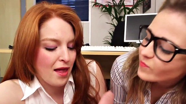 man enjoys from tender mouths of two office sluts on his dick