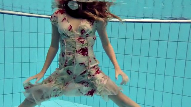 lucy takes the dress off showing her hairy pussy and titties underwater
