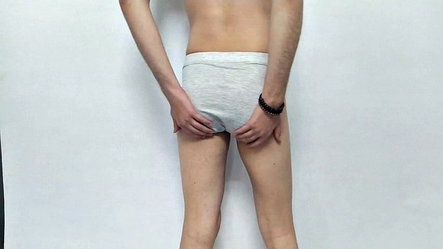 Naked Iranian boy shows his ass and spanks it