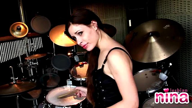 Tattooed solo lesbian masturbates