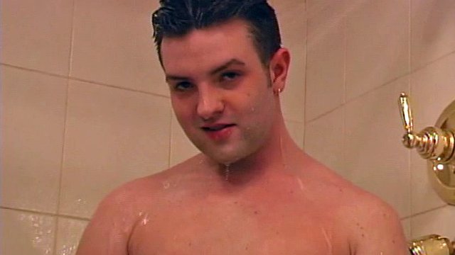 Sexy 21 year old Jeremy West is naked and enjoying a hot shower. First naked and slowly stroking his cock, the young man soon picks up the pace.