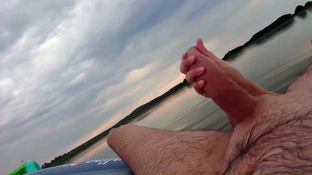 My wife jerks off my dick with a happy ending in the inflatable boat on the lake