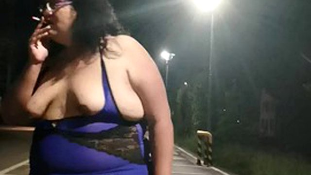 Sissy Vicky TS walks in the parking lot at night