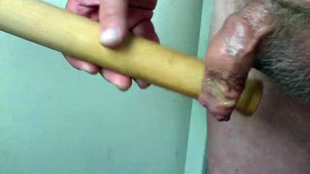 Piss with rolling pin in foreskin