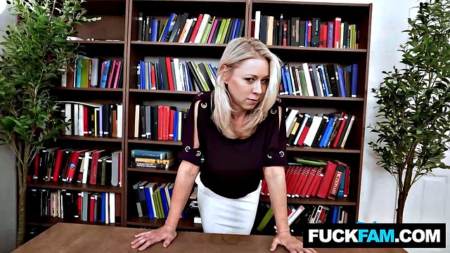 Katie Morgan Delivers Under-Desk Blowjob to Rion King in Office