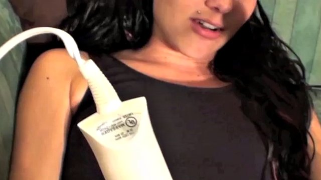 Ballerina Michelle Peters has her slave's cock and balls on a rope