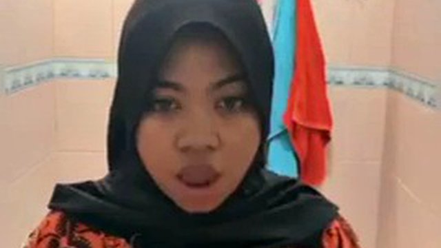 Mother of the glowing hijab