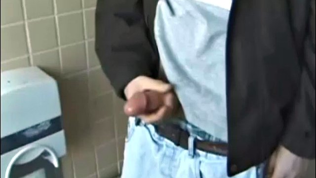 Christian enters the men's bathroom with holes. In one of the cabins, he grabs his cock and starts jerking off. The camera shows us some hot angles of this straight guy as he works himself to the limit.
