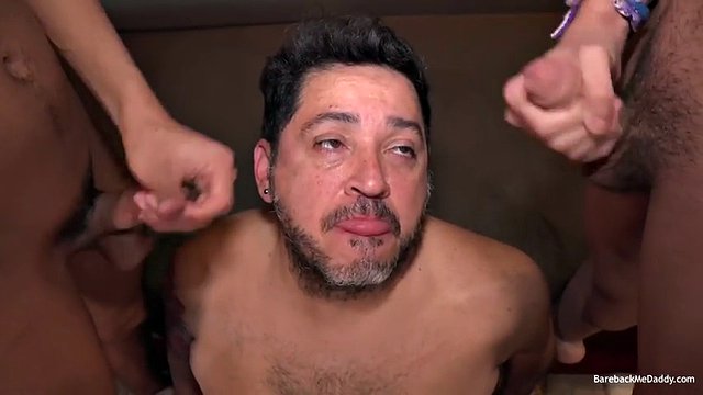 Two cute boys are sitting on the couch with daddy Ferdinand and soon everyone is stripping and a mature man is sucking both of their cocks. Then a double dildo is used to fuck Bruno and Ferdinand at the same time.